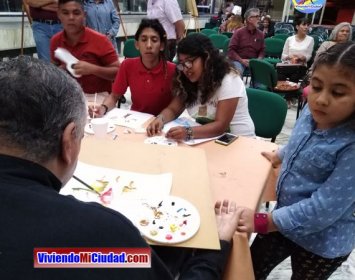 Joel Ramos en el Dia Munidal Pintor Boca y Pie